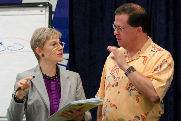 Executive Speech Coach & Creator of FrippVT, Patricia Fripp in Action Photo of Coaching with Client