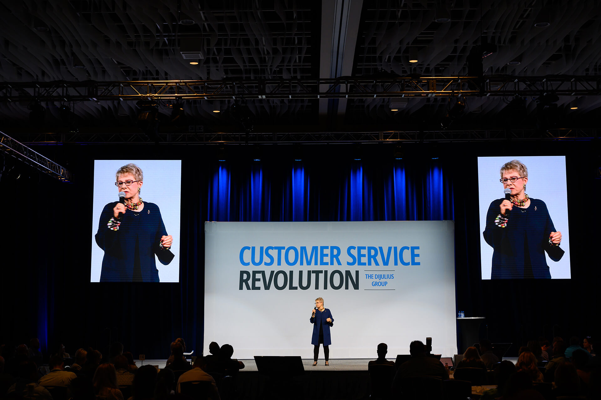 Executive Speech Coach & Creator of FrippVT, Patricia Fripp in Action Photo of Coaching with Client