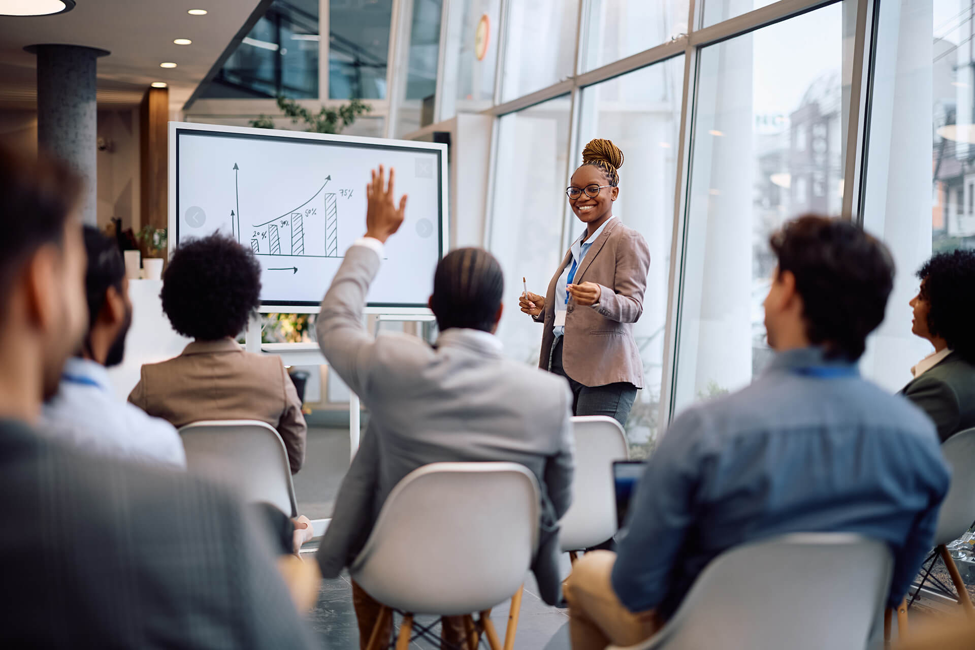 Executive Speech Coach & Creator of FrippVT, Patricia Fripp in Action Photo of Coaching with Client