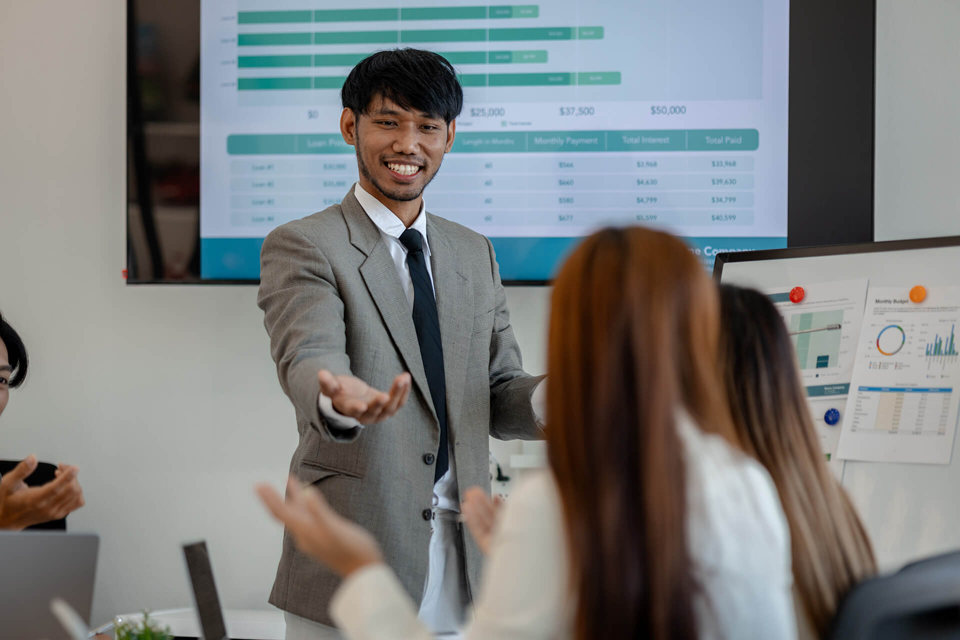 Executive Speech Coach & Creator of FrippVT, Patricia Fripp in Action Photo of Coaching with Client